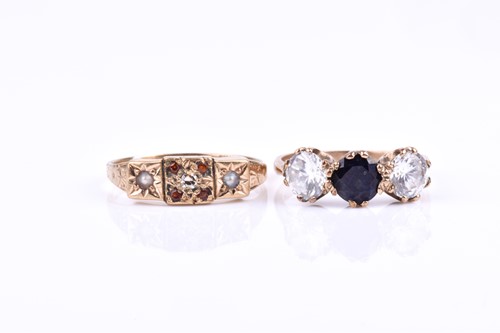 Lot 669 - A 9ct yellow gold, pearl, and garnet ring,...