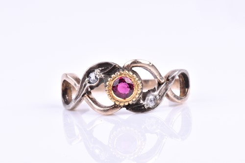 Lot 685 - A yellow metal, silver, diamond, and ruby ring,...