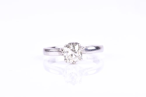 Lot 801 - An 18ct white gold and solitaire diamond ring,...