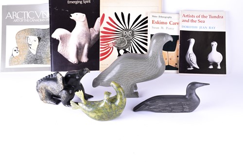 Lot 261 - A collection of four 20th century carved inuit...