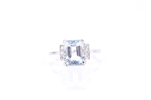 Lot 567 - A platinum, diamond, and aquamarine ring, set...