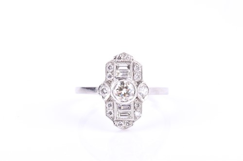 Lot 711 - A diamond and platinum ring, in the Art Deco...