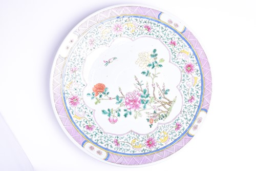 Lot 237 - A Chinese Famille rose dished charger, late...