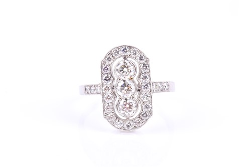 Lot 734 - A platinum and diamond ring, the...