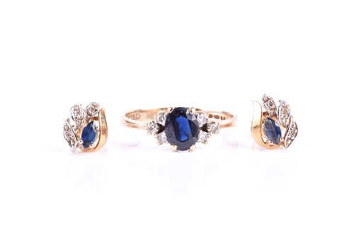 Lot 838 - A 9ct yellow gold, diamond, and sapphire ring,...