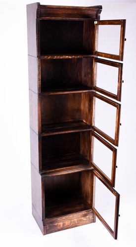 Lot 146 - An early 20th century narrow stacking bookcase,...