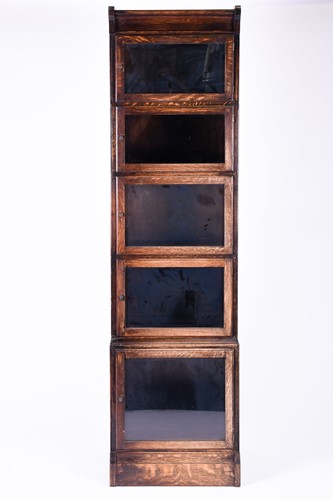 Lot 146 - An early 20th century narrow stacking bookcase,...