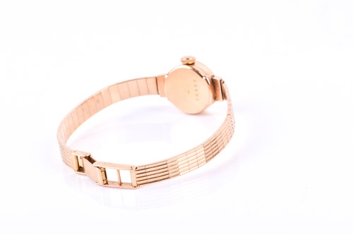 Lot 440 - A yellow metal ladies wristwatch, with small...