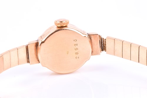 Lot 440 - A yellow metal ladies wristwatch, with small...