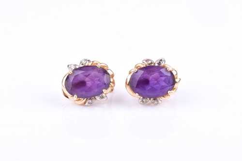 Lot 667 - A pair of yellow gold, amethyst, and diamonds...