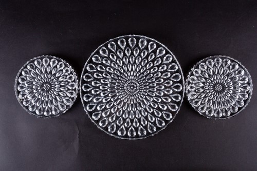 Lot 304 - A pair of Baccarat glass bottle coasters, each...