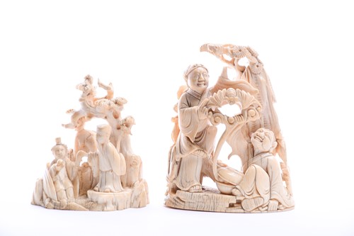 Lot 207 - Two Chinese carved ivory figure groups, early...