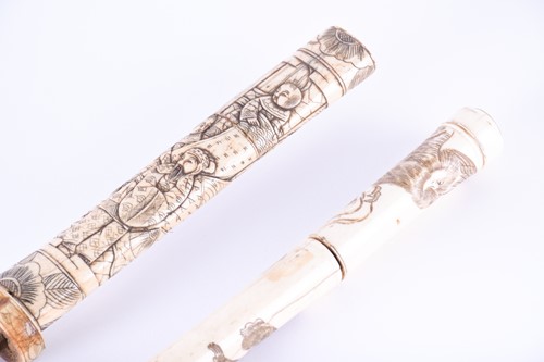 Lot 243 - A Japanese carved bone sword stick, circa 1900,...