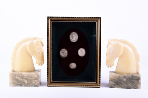 Lot 317 - A pair of Italian alabaster horse head...