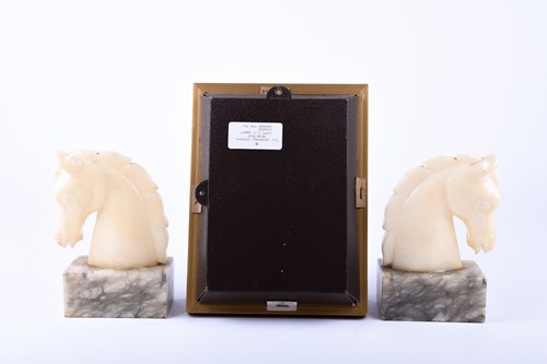 Lot 317 - A pair of Italian alabaster horse head...