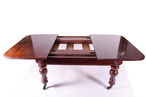 Lot 153 - A Victorian mahogany extending dining table,...