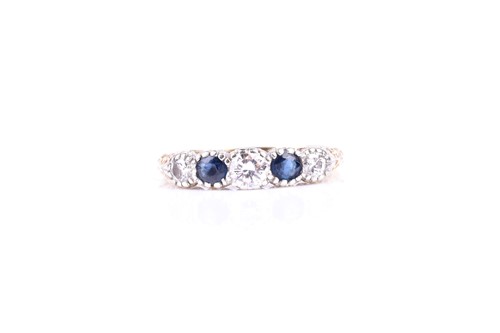 Lot 614 - A 14ct yellow gold, diamond, and sapphire ring,...