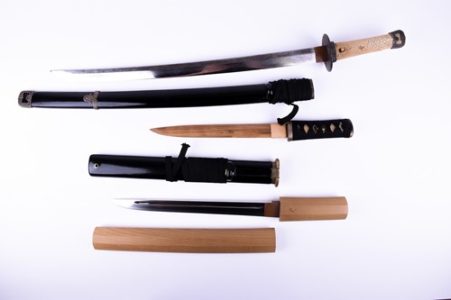Lot 367 - A Japanese Tanto dagger, the tang signed on...