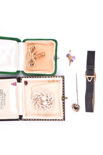 Lot 566 - A Victorian yellow metal and garnet drop...