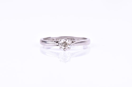 Lot 832 - A platinum and solitaire diamond engagement...