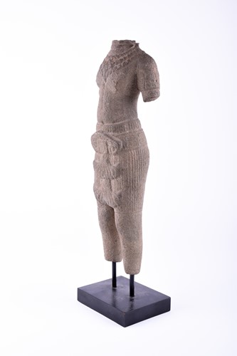 Lot 242 - A Cambodian or Thai carved stone female figure,...