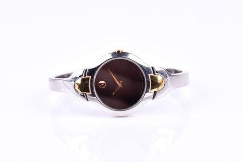 Lot 220 - A ladies Movado stainless steel and gold...