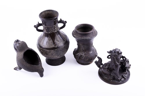 Lot 201 - A collection of Chinese bronzes, comprising an...