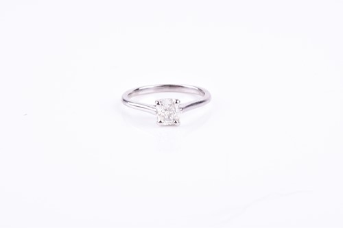 Lot 608 - A 14ct white gold and diamond ring, set with a...