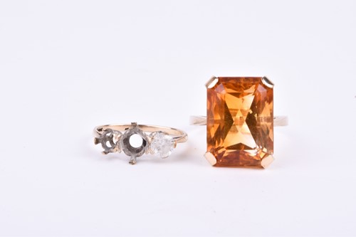 Lot 61 - A 9ct yellow gold and citrine dress ring, set...