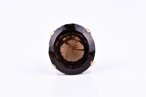Lot 490 - A 9ct yellow gold and smoky quartz cocktail...