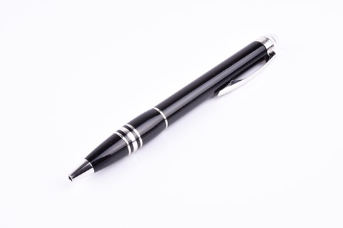 Lot 468 - A Montblanc ball point pen, with black resin...