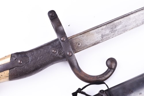 Lot 363 - A late 19th century French sword bayonet and...
