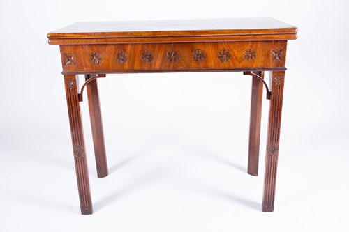 Lot 166 - A Georgian mahogany foldover card table, the...