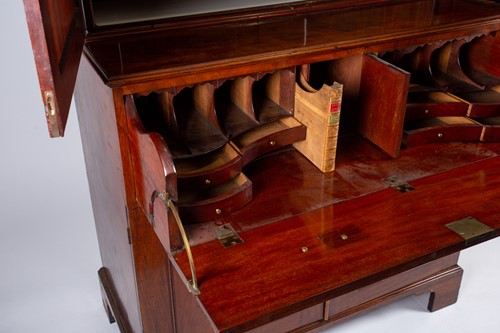 Lot 140 - A George III mahogany secretaire bookcase, the...