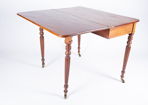 Lot 170 - A Regency mahogany foldover tea table, with...