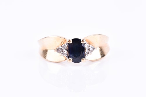 Lot 778 - A yellow metal and sapphire ring, the pinched...