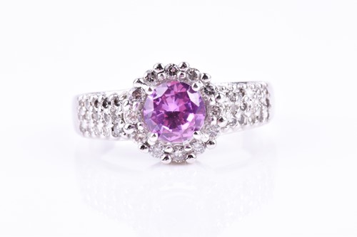 Lot 865 - A diamond and pink topaz cocktail ring, set...