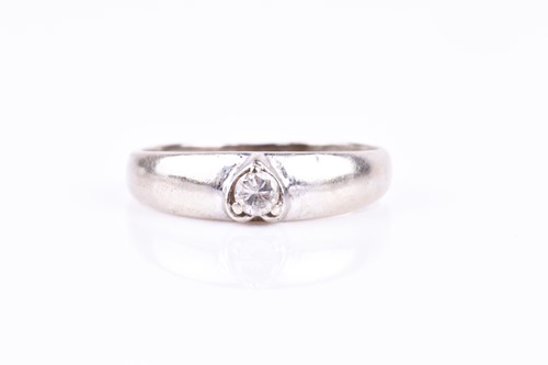 Lot 846 - A white metal and diamond ring, the three-claw...