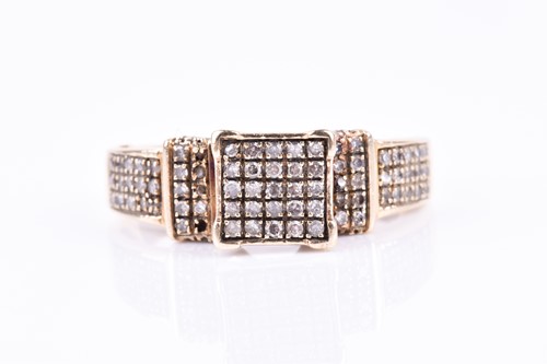 Lot 771 - A yellow metal and diamond ring, pave-set with...