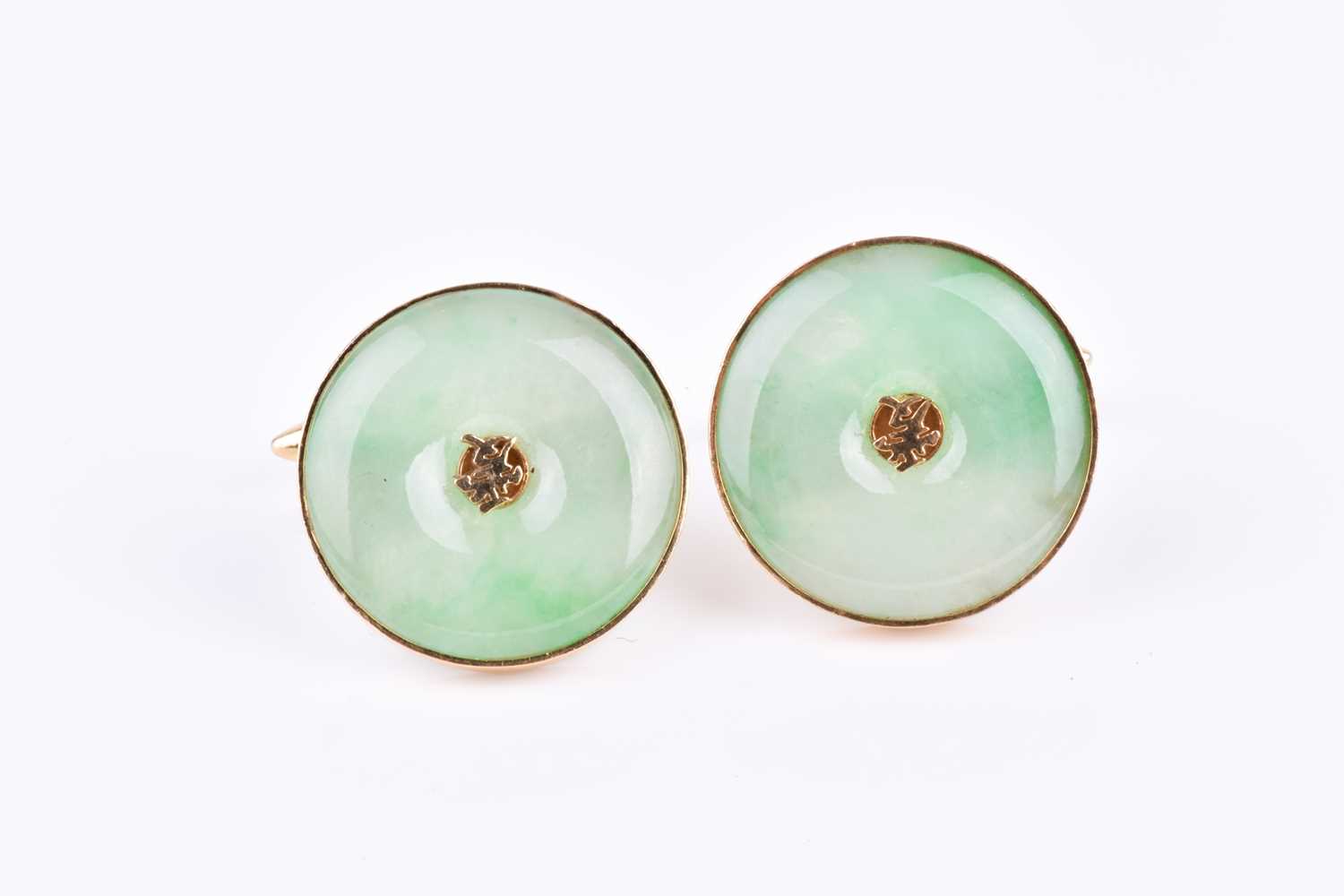 Lot 304 - A pair of yellow metal and green jade...