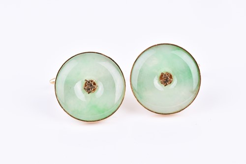 Lot 304 - A pair of yellow metal and green jade...
