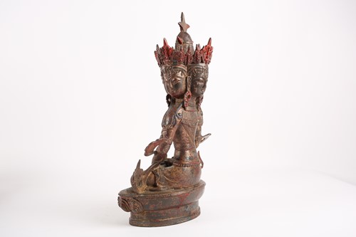 Lot 233 - A parcel gilt bronze figure of Ushnishavijaya...