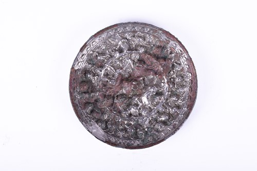 Lot 252 - A Chinese silvered bronze circular 'lion and...