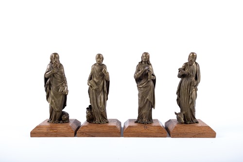 Lot 247 - A group of four gilt metal figures; three...