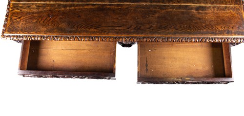 Lot 95 - A Victorian carved oak dining table in the...
