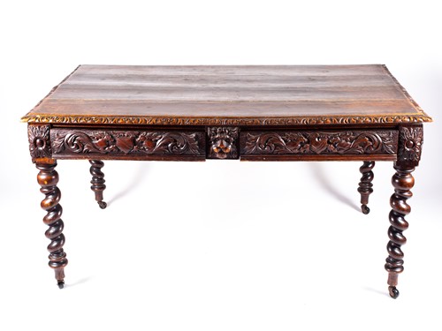 Lot 95 - A Victorian carved oak dining table in the...