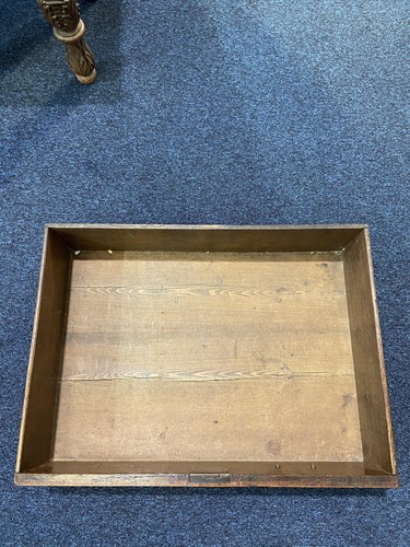 Lot 102 - A George III oak dresser base, the rectangular...
