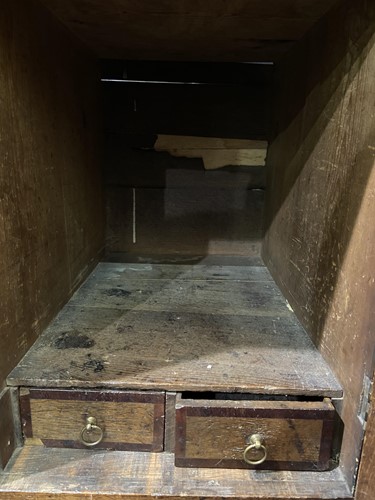 Lot 102 - A George III oak dresser base, the rectangular...