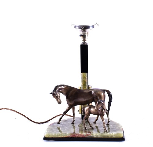 Lot 248 - An Art Deco style equestrian-themed table lamp,...
