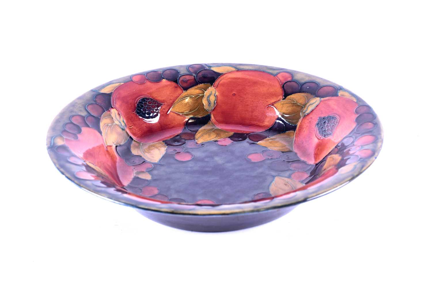 Lot 207 - A William Moorcroft 'Pomegranate' bowl, circa...